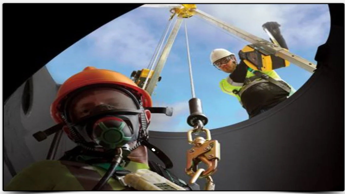 Worker doing confined space entry is descending while attached to a retrieval system.